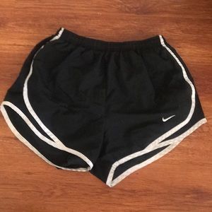 Black Nike running shorts
